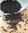 Whole black peppercorns,