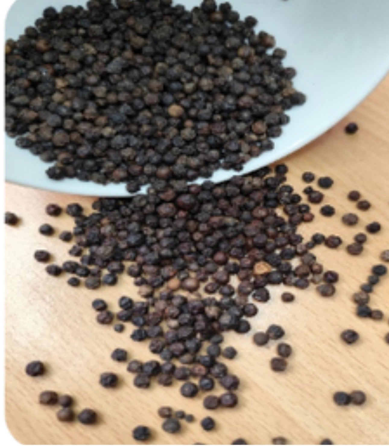 Whole black peppercorns,